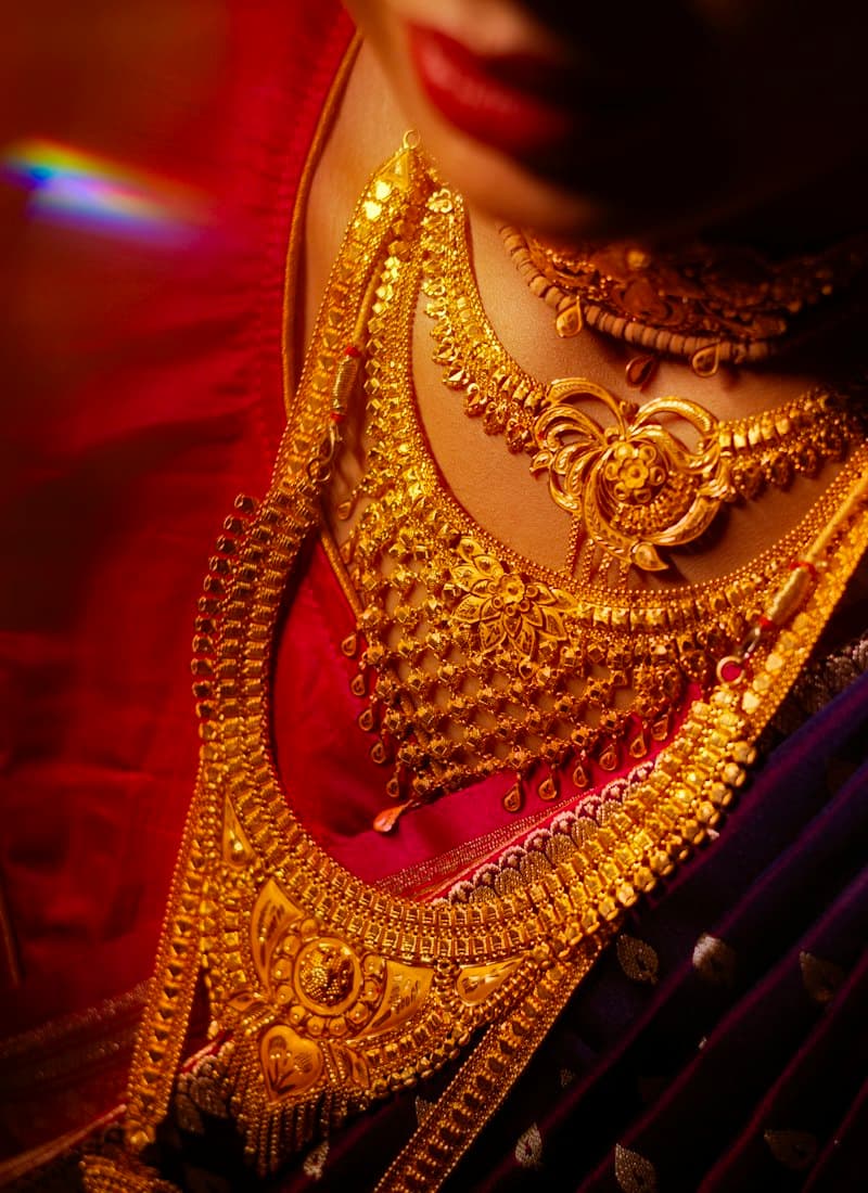 Woman wearing traditional handmade gold necklaces